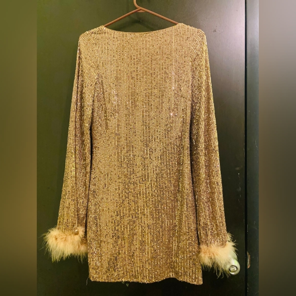 Glamorous Gold Long Sleeve Dress with Feather Accents